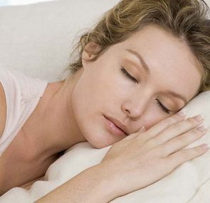 essential guide to deeper sleep woman sleeping