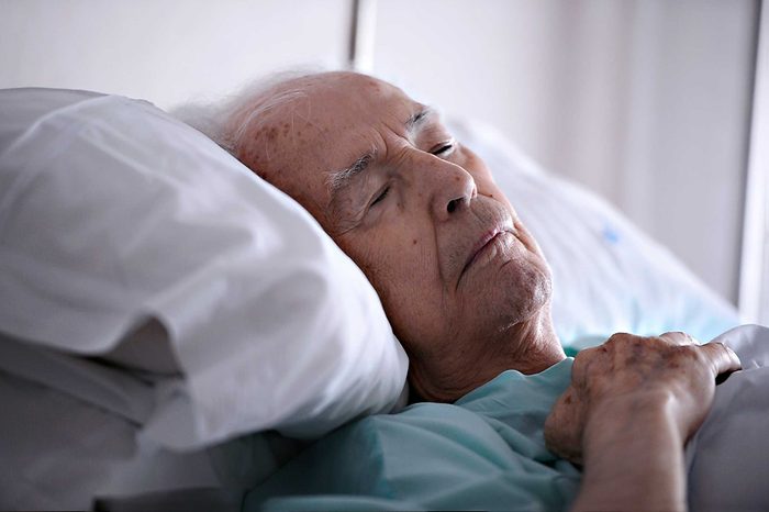 senior man in hospital bed