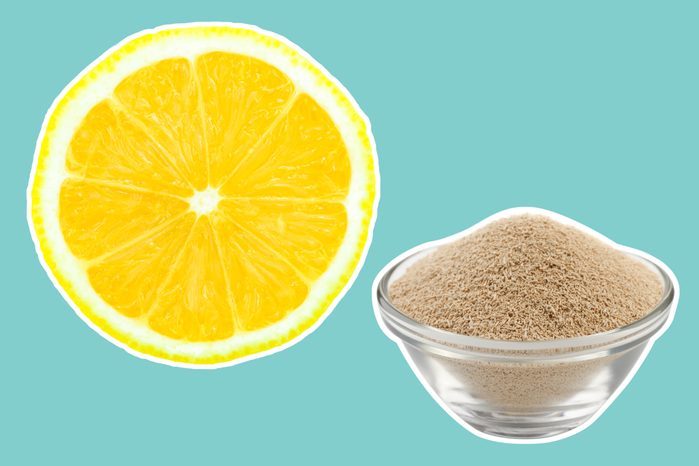 lemon round next to a bowl of brewer's yeast