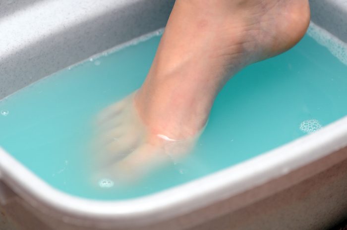 foot soaking in tub