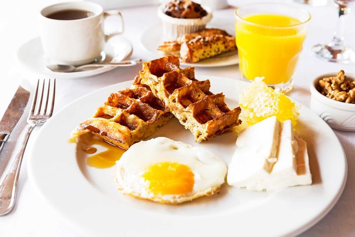 eggs, waffles and orange juice