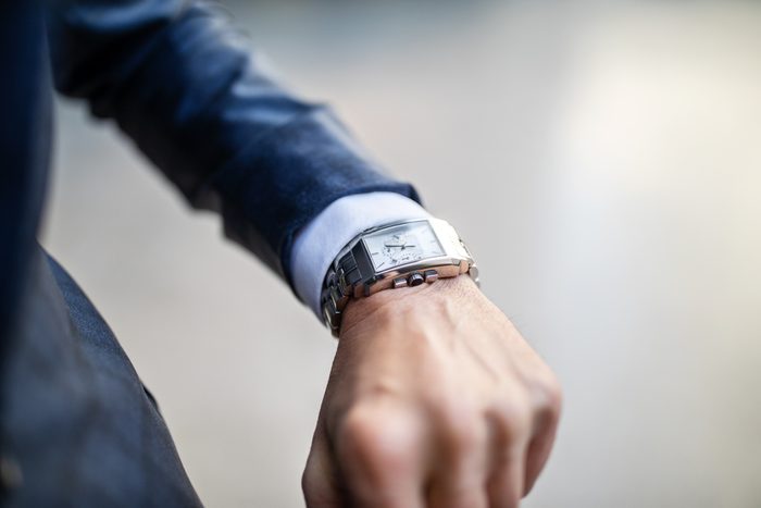 close up of watch on business man's wrist