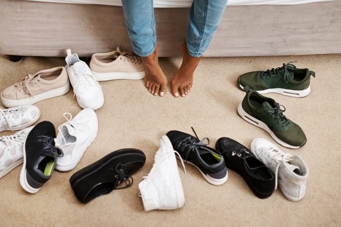 sneakers surrounding feet