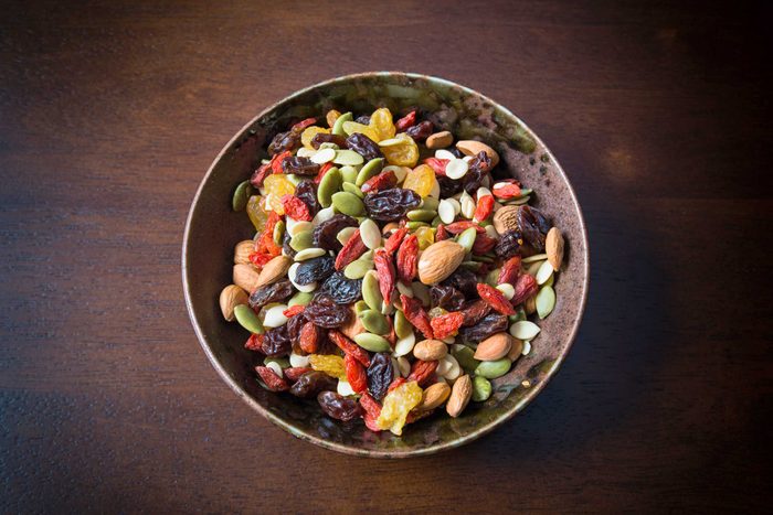 bowl of healthy snack, raisins nuts