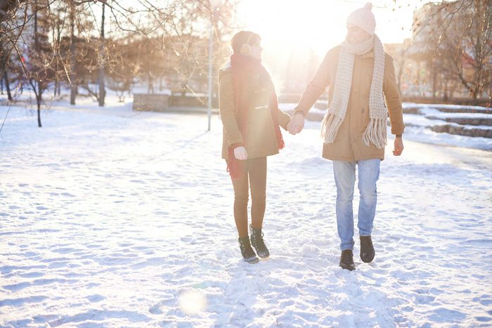 couple walking in snow