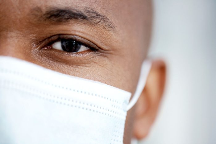 closeup of man in surgical mask