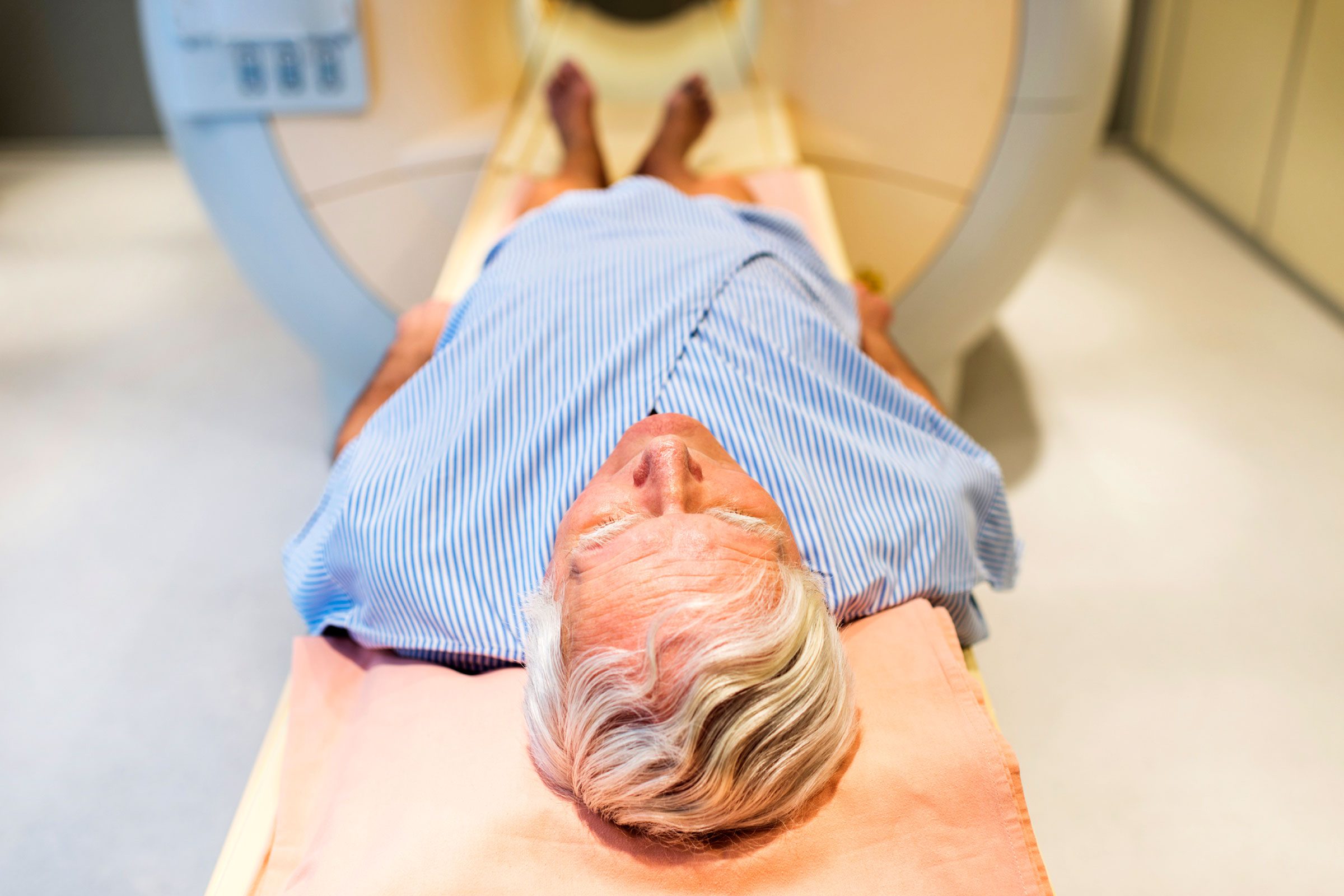 patient going into body scan machine