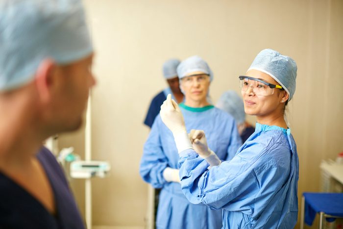 surgeons wearing surgical gear