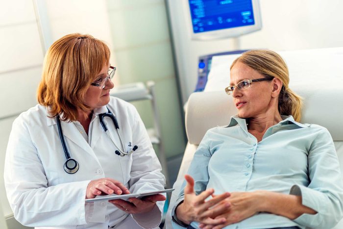 female doctor discussing diagnosis with female patient