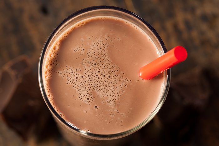 glass of chocolate milk with red straw