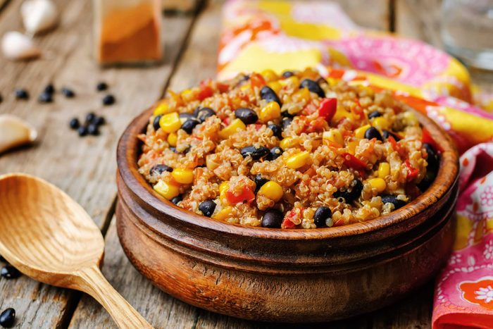 bowl of quinoa with corn, tomatoes, and black beans