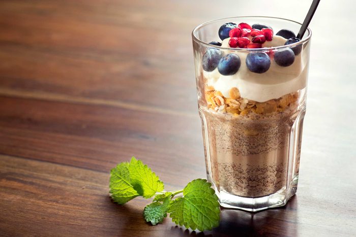 Fiber-rich smoothie topped with oats, yogurt, and berries.