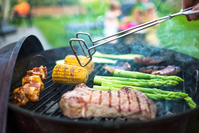grilling meat and vegetables