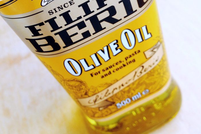close up of olive oil bottle label