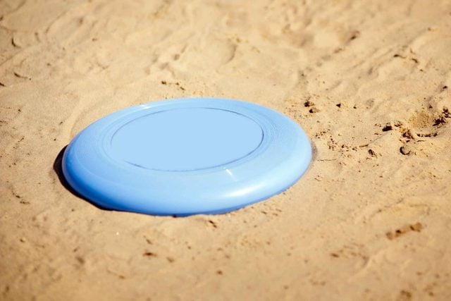 frisbee in sand
