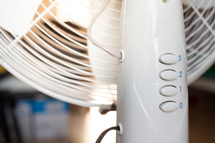 close up of standing fan in home