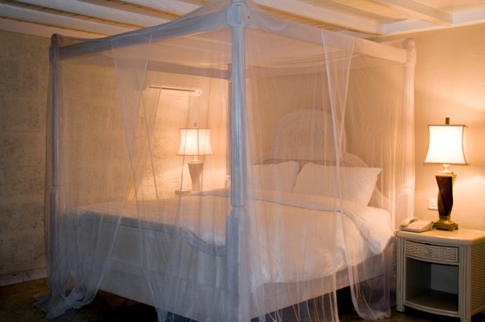 mosquito net canopy over bed