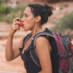 asthma inhaler woman hiking