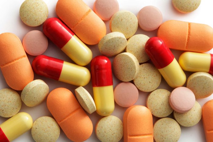 yellow, orange, and red pills
