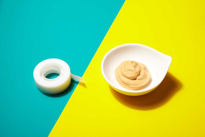 Illustration of portion control trick: tape roll and hummus