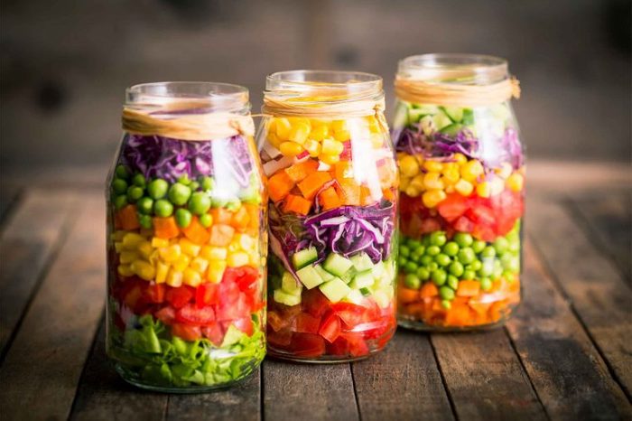 jars with layered chopped produce