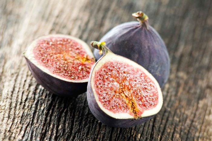 a whole fig and a fig sliced in half
