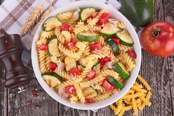 Bowl of pasta with fresh vegetables