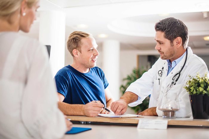 doctor discussing treatment with a patient