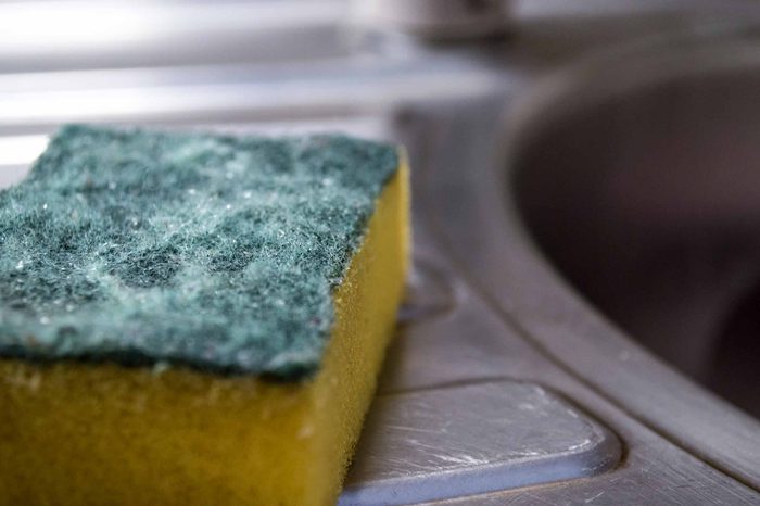 Sponge drying on a kitchen sink