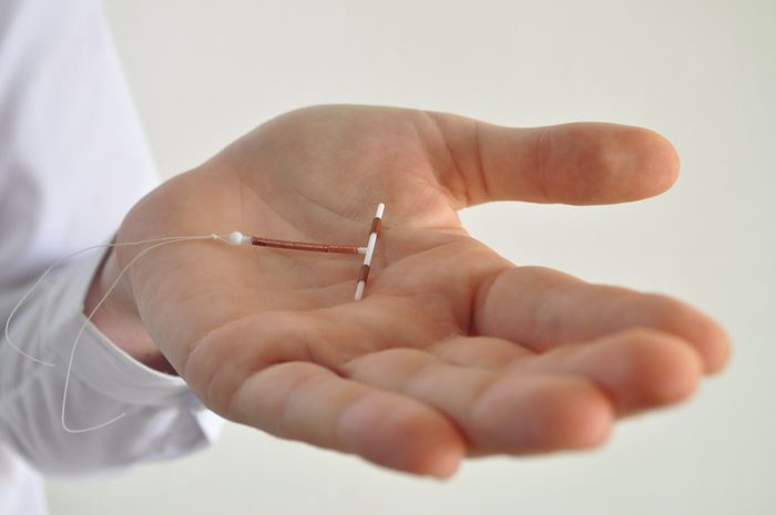 IUD birth control in hand