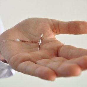 IUD birth control in hand