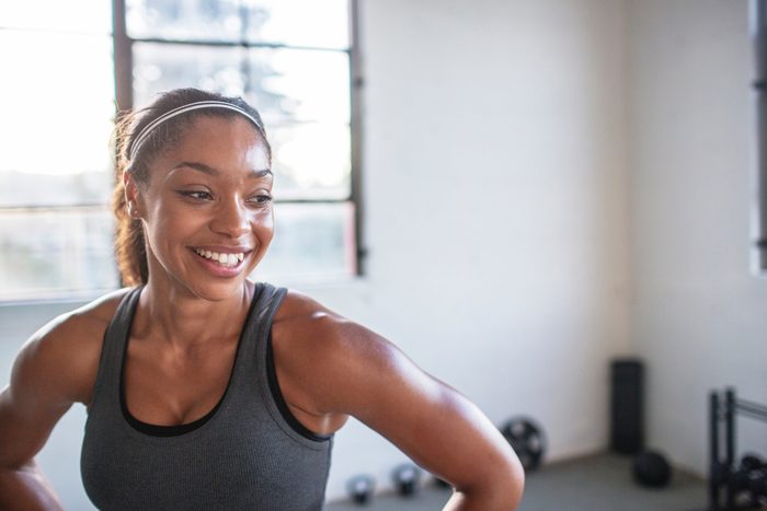 smiling woman during exercise workout