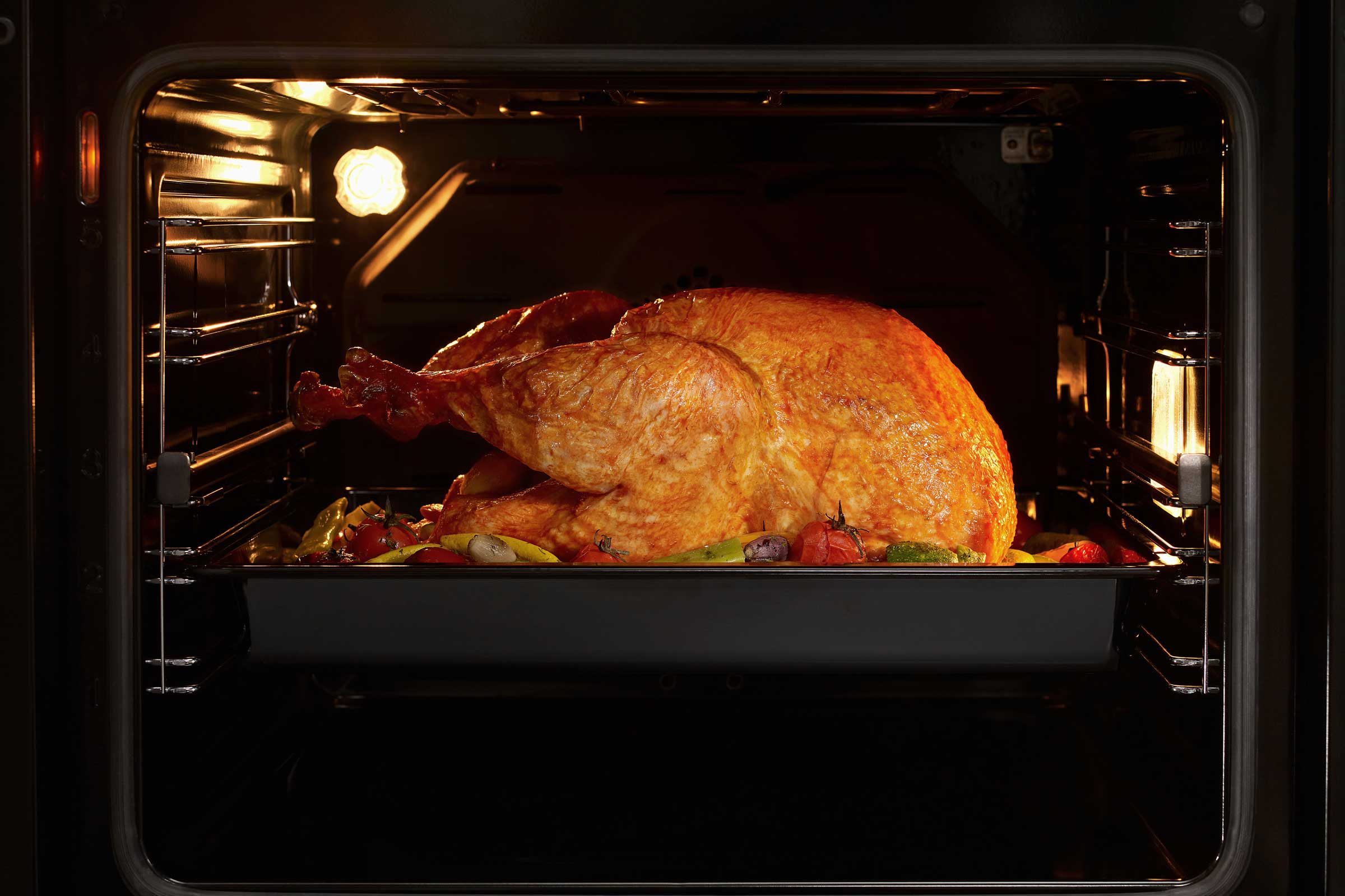 turkey roasting in an oven