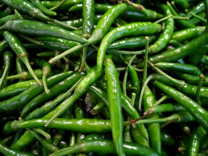 Group of green chili peppers