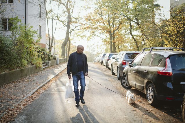 man walking with his dog