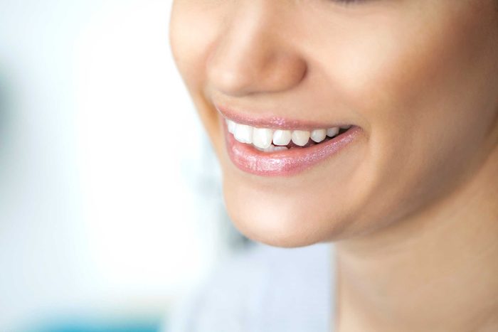 woman's smile showing her teeth