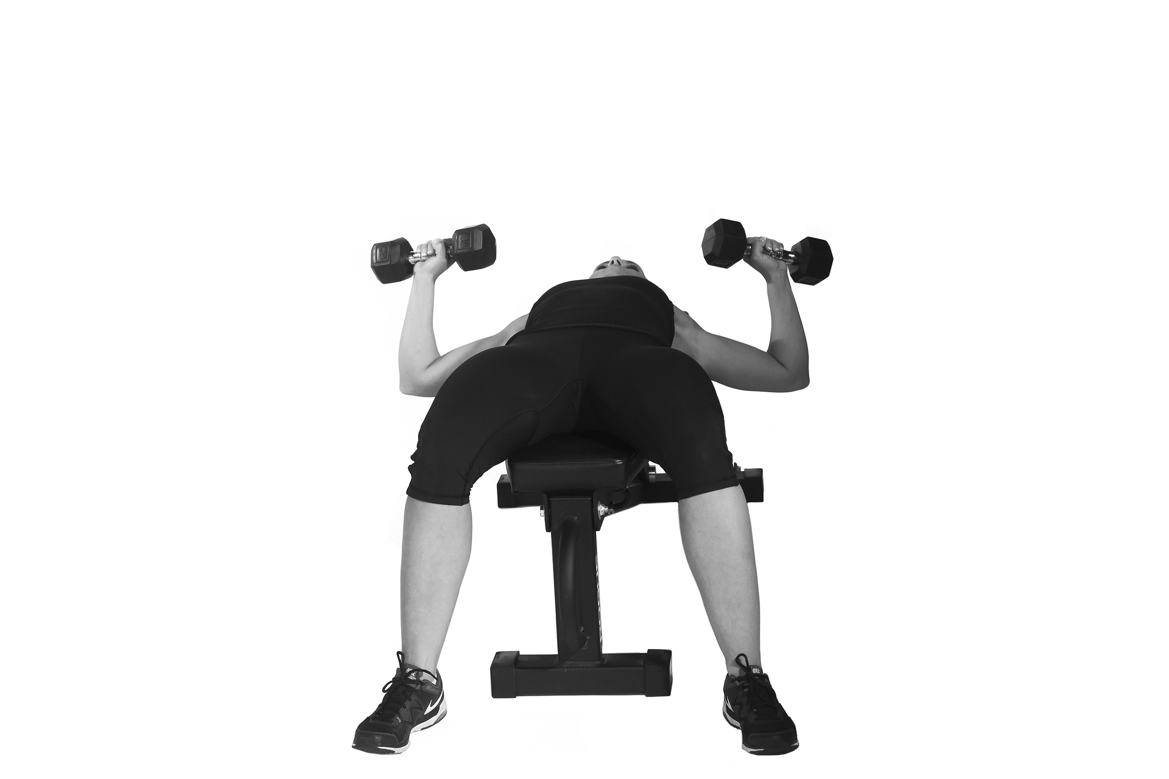 Person doing flat dumbbell bench press.