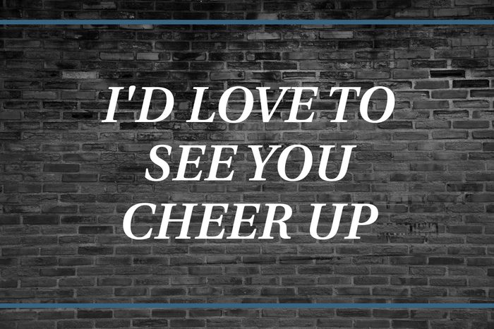 Brick wall background that says: I'd love to see you cheer up."