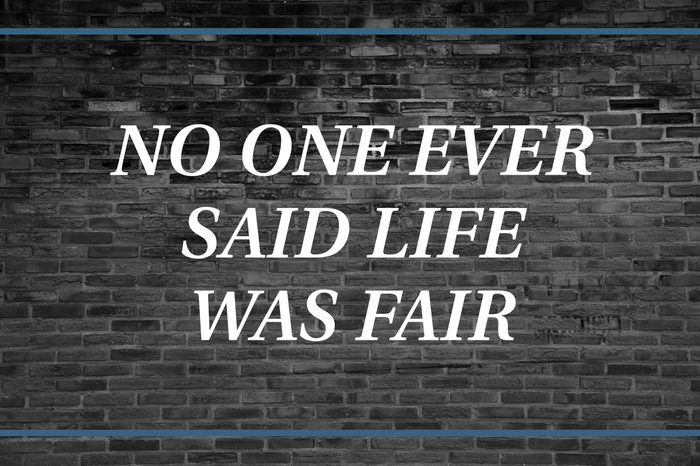 Brick wall background that says: No one ever said life was fair.