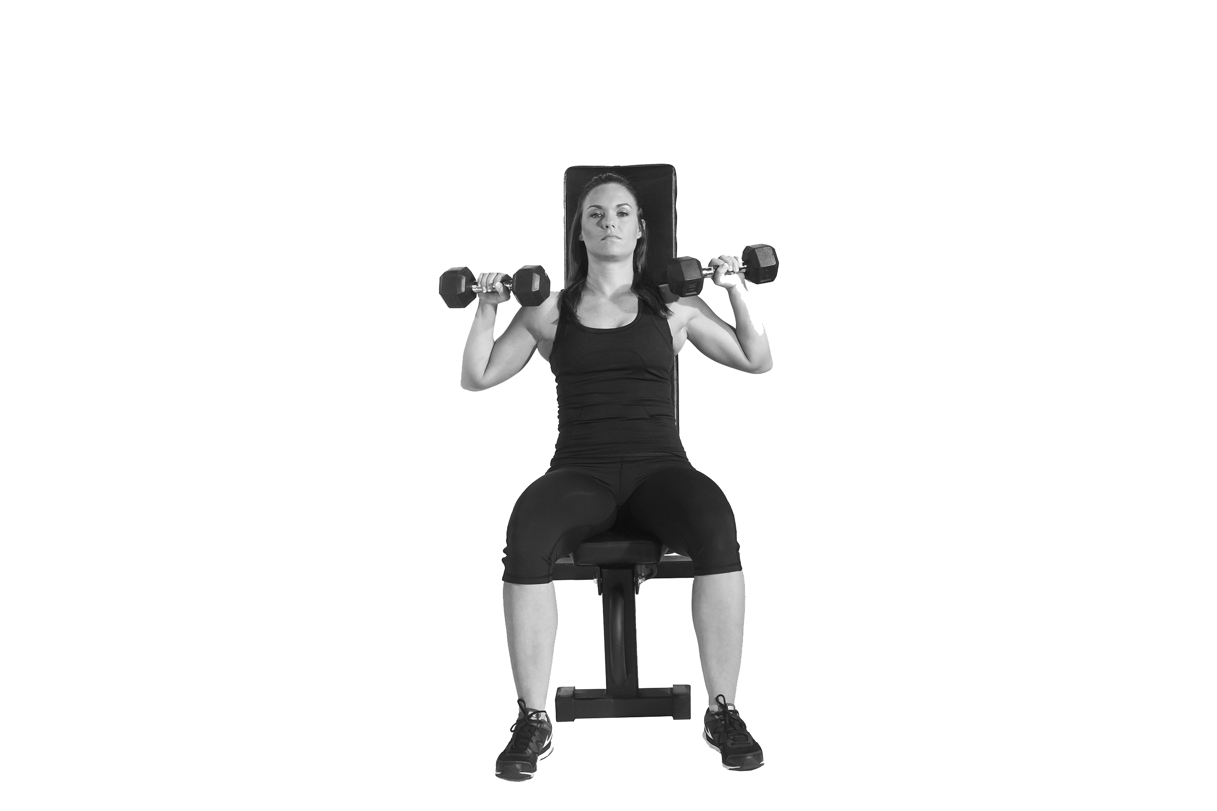 Woman doing seated dumbbell shoulder press.