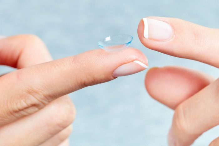 Contact lens on a person's finger.