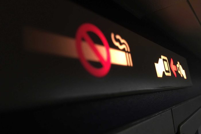 no smoking sign on airplane