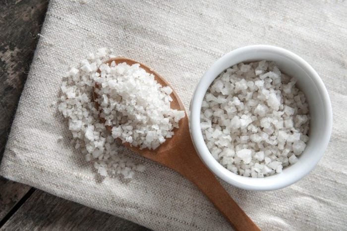 coarse salt in a dish and on a spoon