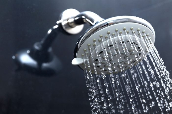 Showerhead with water coming out.