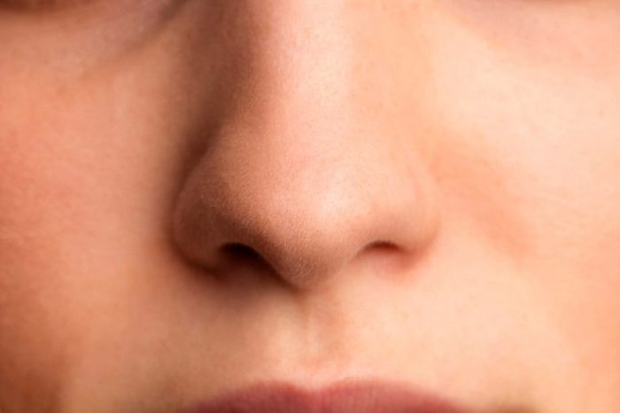 close up of a woman's nose