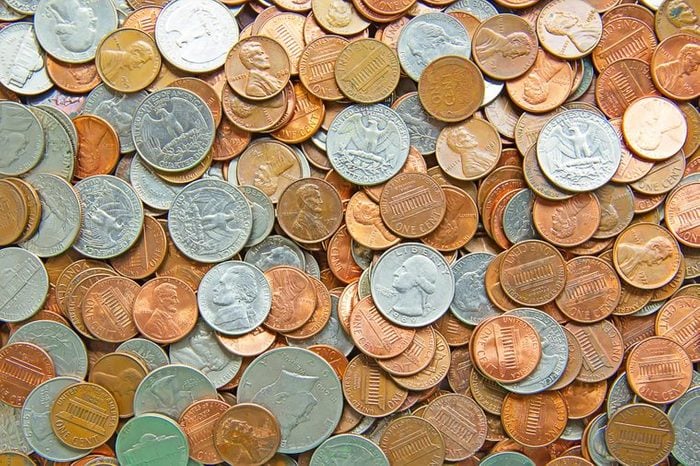 assortment of coins: quarters, nickels, dimes and pennies