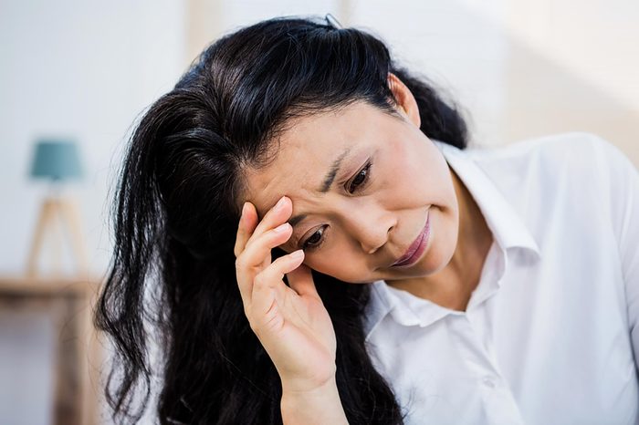 woman looking stressed and sad