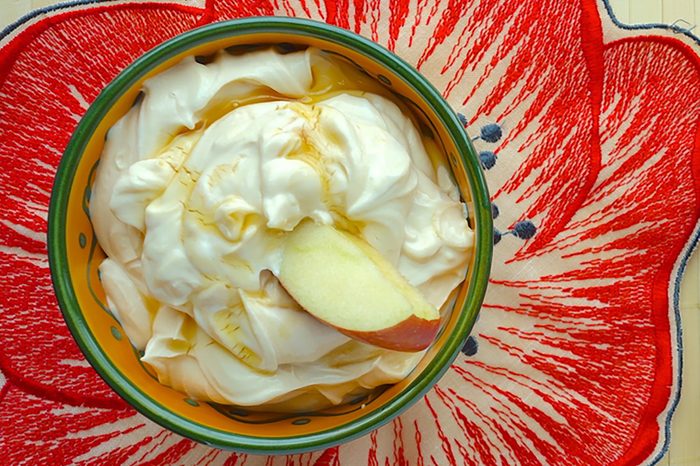 Yogurt dip with apple-slice dippers. 