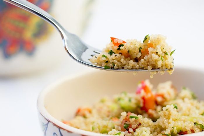 Forkful of quinoa and vegetables.