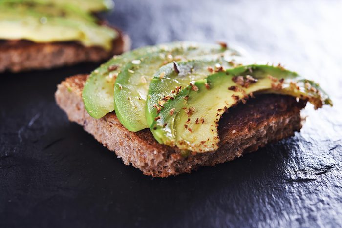 avocado slices on slice of toast
